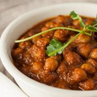 Rawalpindi Chole Lababdar · Garbanzo beans / aromatic spices / chai leaves