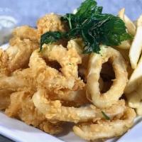 Calamari & Chips  · Fried Calamari & Fries.
Choice of Tamarind or Tartar Sauce