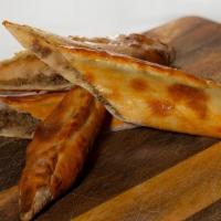 Bafra Pide - Closed Pide with ground beef & onions · Famous pide from town of Bafra in Black Sea region, ground beef and onions