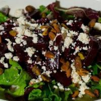 Beets Salad - Beets Salad · Beets marinated with lemon, basil, EVOO and pomegranate dressing with feta cheese and pistac...