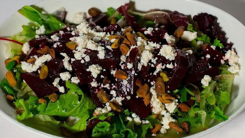 Beets Salad - Beets Salad · Beets marinated with lemon, basil, EVOO and pomegranate dressing with feta cheese and pistachios.