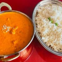 Butter Chicken · Curry of chicken in a spiced tomato, butter and creamy sauce.