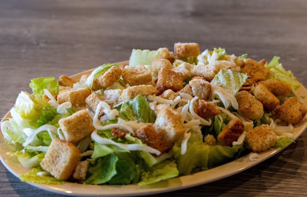 Caesar Salad · Romaine lettuce, croutons, parmesan cheese, mozzarella cheese, Caesar dressing, add chicken extra.