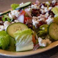 Greek Salad · Romaine lettuce, Kalamata olives, cucumbers, feta cheese, red onions, tomatoes, Italian dres...
