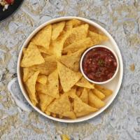 Smokin' Salsa & Chips · Warm up with toasty tortilla chips served with a side of tangy salsa.