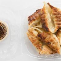 Housemade Pot Stickers · Chinese potstickers freshly filled with your choice of pork or chicken and cooked to order. ...