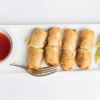 Crispy Spring Rolls (4) · Deep fried and filled with shredded vegetables. Served with sweet and sour sauce and hot mus...