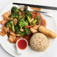 Broccoli Chicken · Fresh ginger with carrots and broccoli in a tasty brown sauce.
