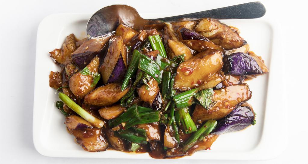 Szechuan Eggplant · Sliced eggplant stir fried with green onions in a spicy garlic sauce.