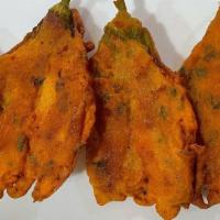 Original Pumpkin Pakora · Fried crisp fritters made with pumpkin.