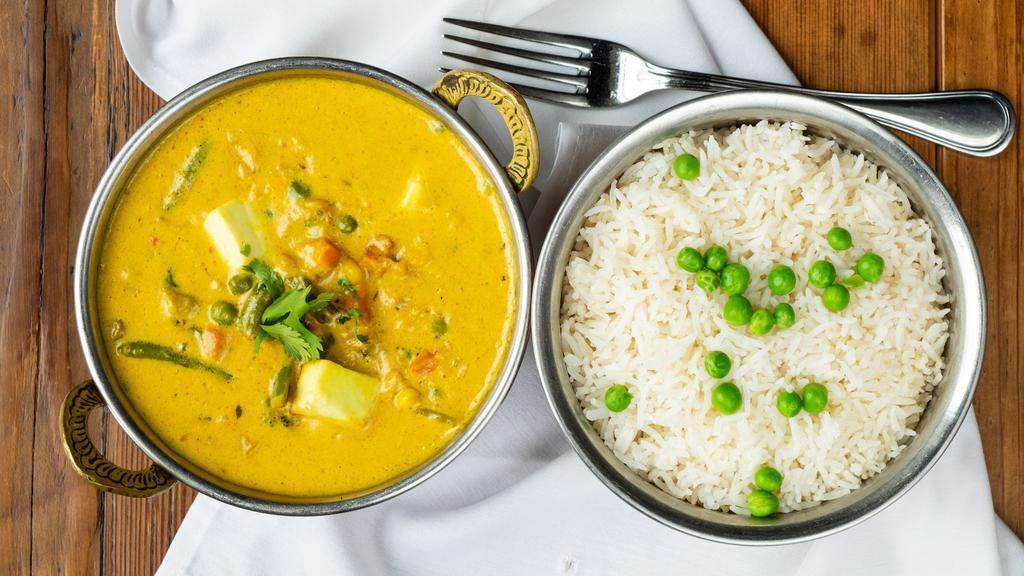 Vegetable Korma · Mixed vegetable cooked with coconut milk, onion and tomatoes in creamy cashew sauce.