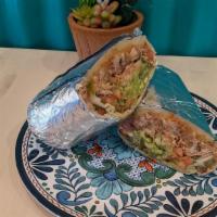 Super Burrito · Beans, rice, cheese, guacamole, sour cream, lettuce, salsa fresca, and jalapenos with your c...
