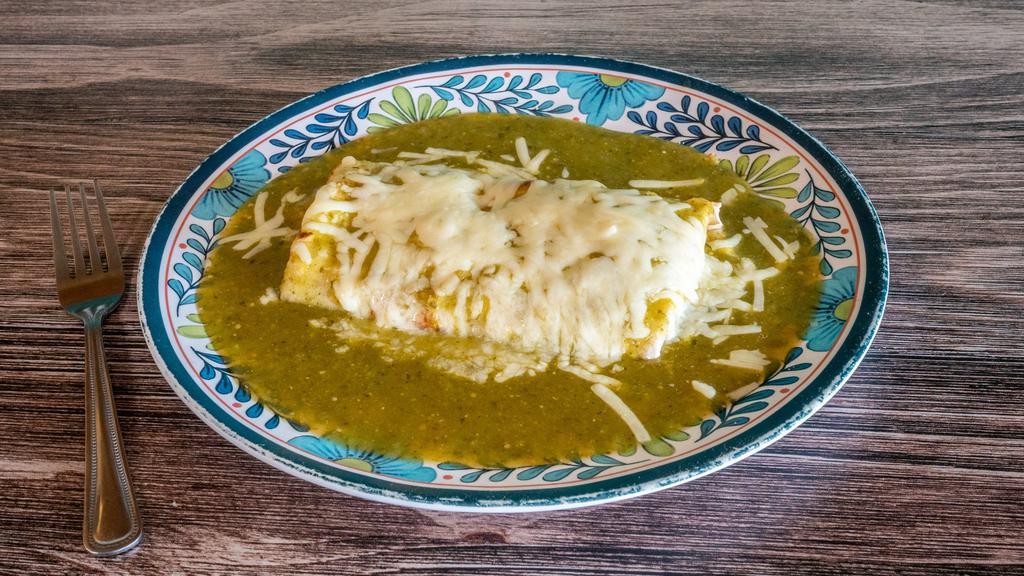 Gourmet Burrito (Wet) · Wet Burrito. Choice of slow-roasted shredded beef, beef and beans, chicken, chicken and beans or refried beans. Topped with mild red sauce or green spicy sauce and melted cheese.