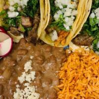 3 Street Taco Plate · Three street tacos with your choice of meat. Served with rice, beans with Mexican cheese, ra...
