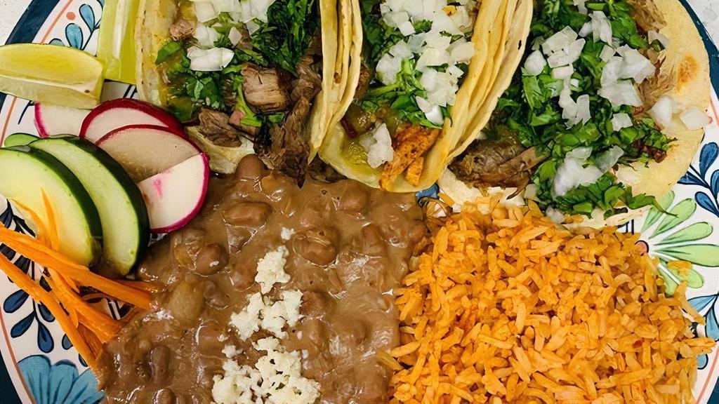 3 Street Taco Plate · Three street tacos with your choice of meat. Served with rice, beans with Mexican cheese, radish, carrots, cucumbers, and lime wedges.