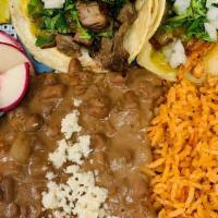 2 Street Taco Plate · Two street tacos with your choice of meat. Served with rice, beans with Mexican cheese, radi...