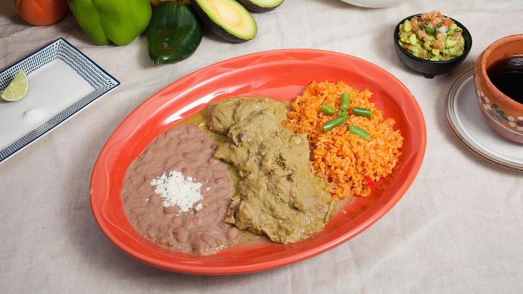Pork Pipian · Pipian has a wonderfully tangy and nutty flavor with a balanced spiciness. A traditional dish from central Mexico. Made with pumpkin seeds, fresh chiles, tomatillo, epazote herbs, and cilantro. Served with rice, refried beans, and corn or flour tortillas.