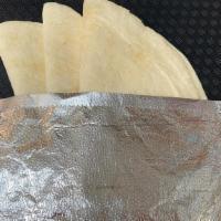 Side (3) Tortillas · Three corn or flour tortillas
