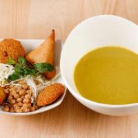Samosas Soup · Vegan, contain gluten. Samosas, falafel, yellow pea, cabbage and masala spice.