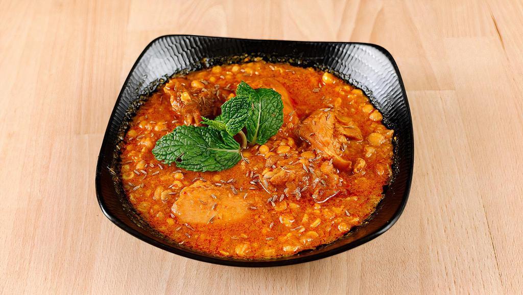 Chicken Chana Dal · Boneless chicken with chana dal in a creamy curry sauce.