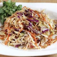 Rice Noodle Salad  · Nan gyi thok. Vegan. Rice noodle, shredded cabbage, onion and fresh lime.