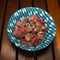 Classic Ahi Shoyu Poke by the pound  w/ Seaweed Salad · Tuna Poke, green onions, and our special house ponzu (shoyu & calamansi)  sauce.
