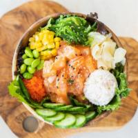 Sweet Miso Salmon Poke · All salmon in our house meet sweet miso sauce. Bowl comes with cucumbers, garlic crab mix, g...