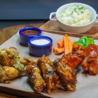 10 Wings and a side of your choice · 10 premium wings, sourced locally, fired to order, paired with your choice of 15 sauces prep...
