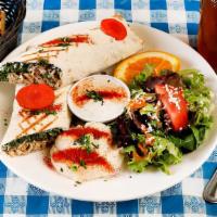 Chicken Shawerma Plate · Spiced baked chicken sandwich, wrapped in lavash bread then grilled. Served with a cucumber,...