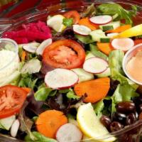 Mixed Green Salad Platter · Salad of fresh organic mixed greens, tomato, cucumber, feta cheese, olives, veggies, and our...