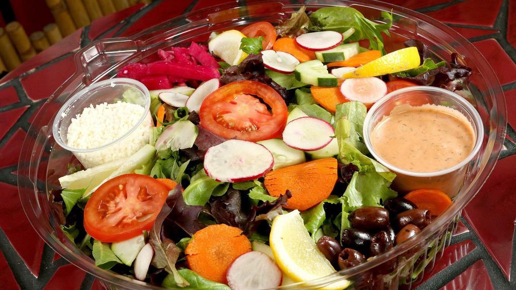 Mixed Green Salad Platter · Salad of fresh organic mixed greens, tomato, cucumber, feta cheese, olives, veggies, and our house tomato vinaigrette.