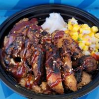Lailai combination bowl · Lamb and chicken bbq served with chicken palau rice, lamb sausage,  mango salad, and steamed...