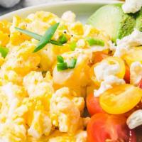 The Greek Scrambled Eggs · Sizzling scrambled eggs with spinach, tomatoes, mushrooms and fresh feta cheese. Served with...