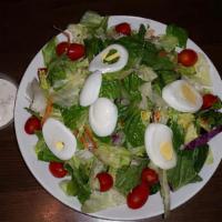 Garden Salad · Garden Mix of Iceberg, Romaine, Carrot, Red Cabbage, Green Onion, Grape Tomato and Hard Boil...