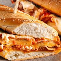 Grilled Chicken Parmesan Sandwich · White meat chicken, Parmesan cheese, and warm red sauce.