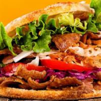 Gyro Sandwich · Mediterranean famous gyro sandwich made with fresh gyro meat, onions, tomatoes, and cucumber...