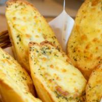 Garlic Bread with Cheese · Crispy garlic bread topped with melted cheese on top.