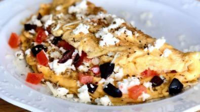 Greek Omelette · Sautéed gyro, onion, and tomatoes. Topped with feta cheese. Includes toast and hash brown.