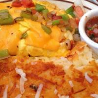 Mexican Omelette · Mushrooms, onions, tomatoes, bell peppers, cheddar cheese and salsa on the side.