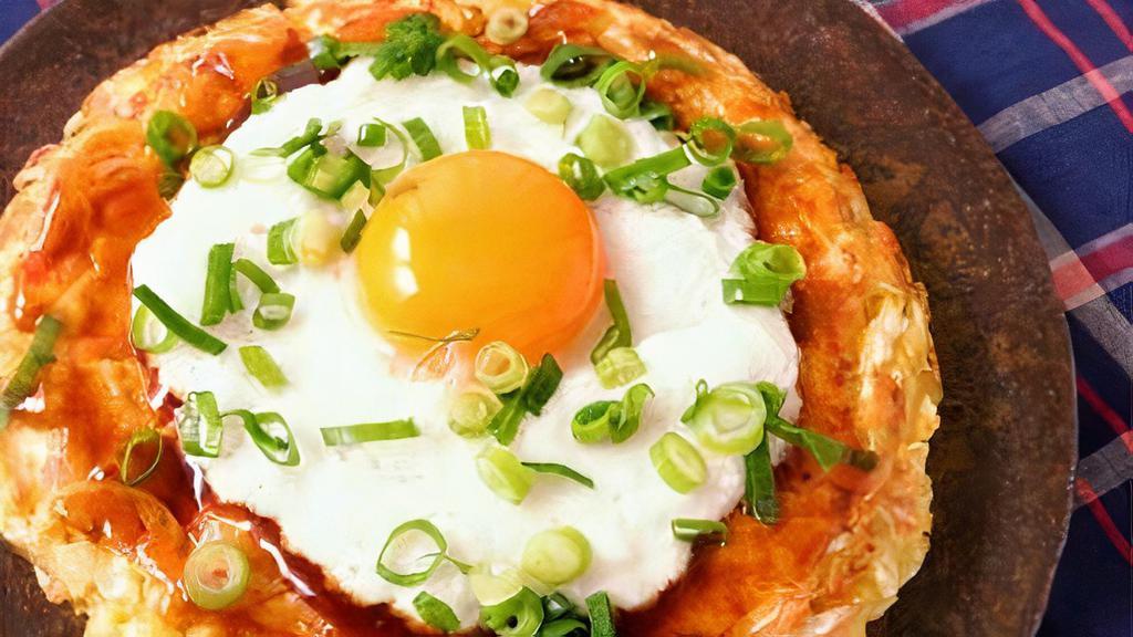 Okonomiyaki · Okonomiyaki is a Japanese savory pancake dish consisting of wheat flour batter and other ingredients cooked on a teppan. Out additions include  seafood, and toppings include okonomiyaki sauce, katsuobushi, Japanese mayonnaise, and top of fried eggs.
