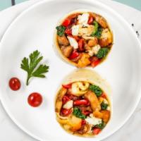 Mediterranean Breakfast Burrito · Spinach, mushrooms, tomatoes, feta cheese, eggs, tomatoes and onions wrapped in a flour tort...