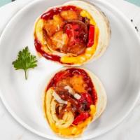 Spicy Hot Breakfast Burrito · Eggs, spicy jalapenos, hot sauce, cheddar cheese, onions, tomatoes wrapped in a flour tortil...