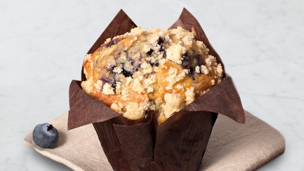 Blueberry Muffin · Baked-in-house blueberry muffin loaded with berries and topped with streusel crumble.