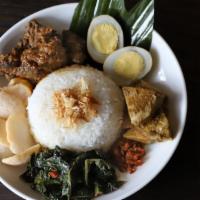 Beef Rendang Rice Platter · An incredible rich spiced beef stew cooked in slow heat with coconut milk, served over rice ...
