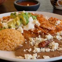 Chilaquiles Mexicanos · Fried tortillas with salsa and cheese.