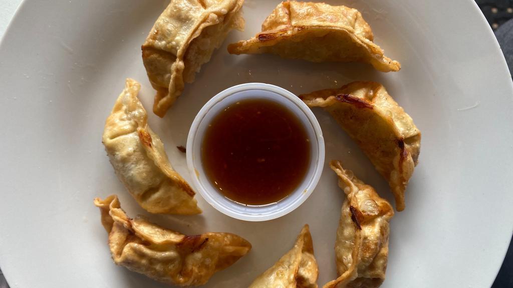 Chicken Gyoza (7pc) · Deep-fried chicken potstickers served with homemade ginger sauce.