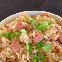 Spam Fried Rice · Fried rice mixed with spam, veggies and eggs .