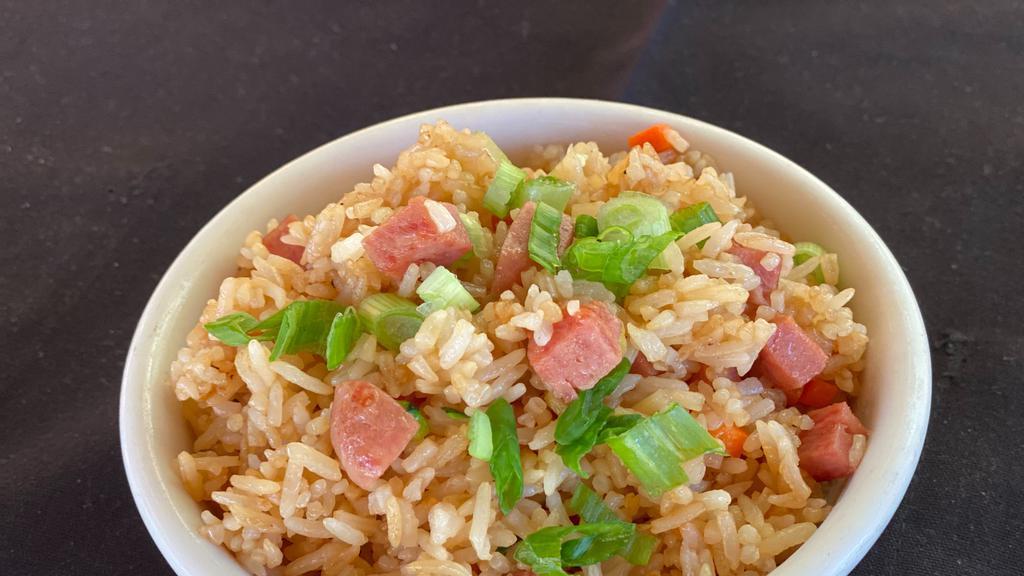 Spam Fried Rice · Fried rice mixed with spam, veggies and eggs .