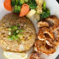Shrimp Dinner · 10pc shrimp cooked in hibachi grill comes with veggies, steam rice and homemade dipping sauc...