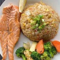 salmon dinner  · 6oz of fresh salmon cooked in hibachi grill comes with veggies, steam rice and homemade ging...